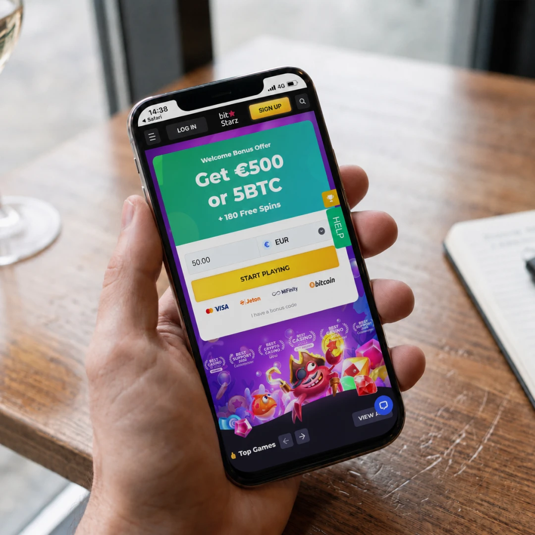 An iPhone 13 in hand running the BitStarz mobile casino in Safari over 4G, a pokie spinning in the browser; the status bar shows network and time.
